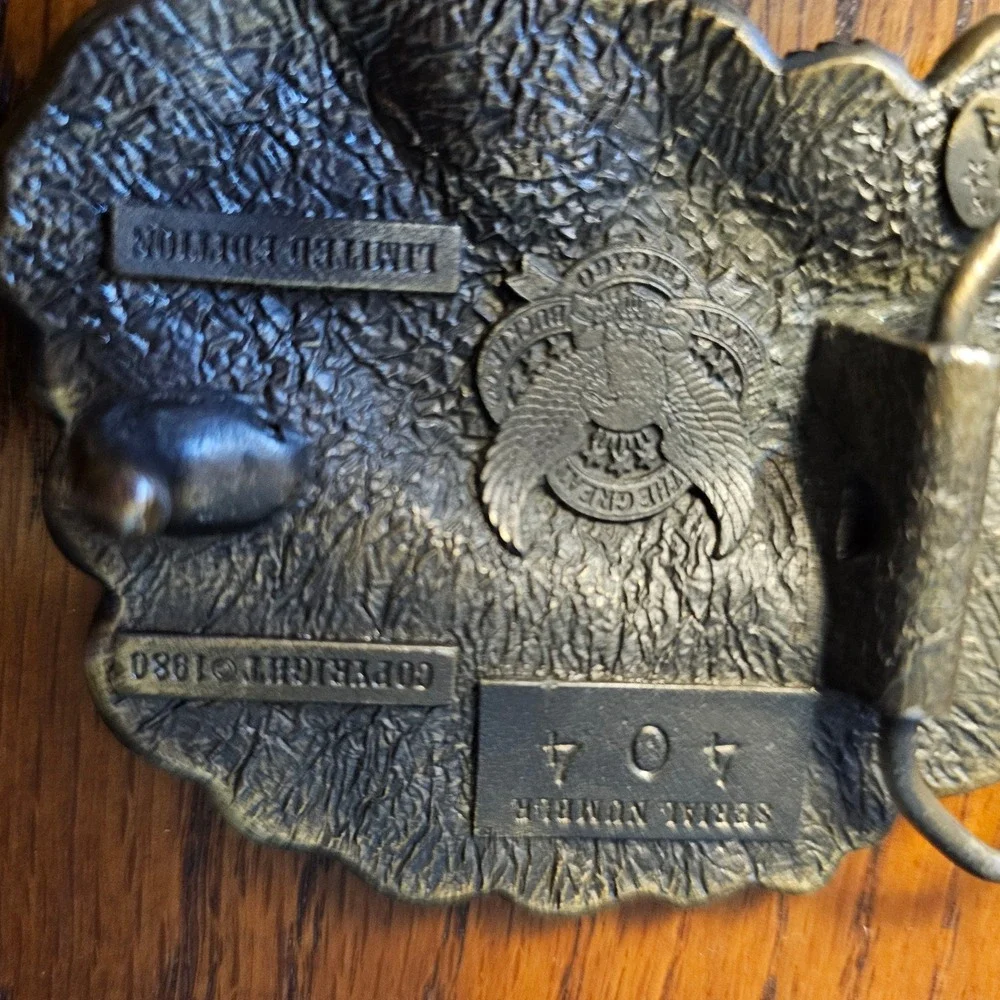 Great American Buckle Co 1980 4-Wheelers Do It In The Dust Brass Belt Buckle 404